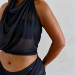 mesh scarf worn as a top