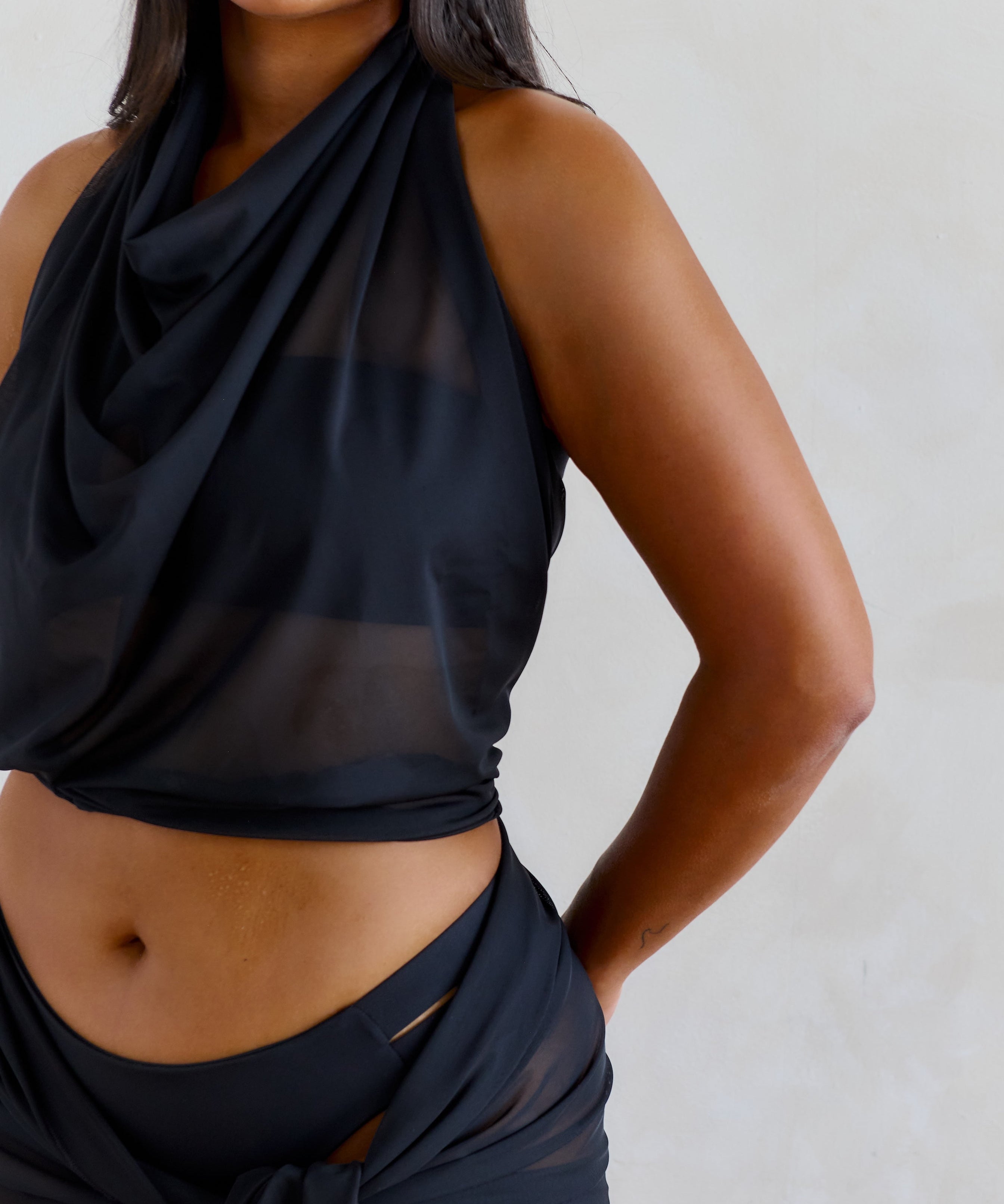 mesh scarf worn as a top