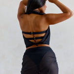 mesh scarf worn as a top