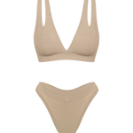 Matching two piece beige underwear set, bra with v plunge and double shoulder strap detail. 