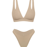 Matching two piece beige underwear set, bra with v plunge and double shoulder strap detail. 