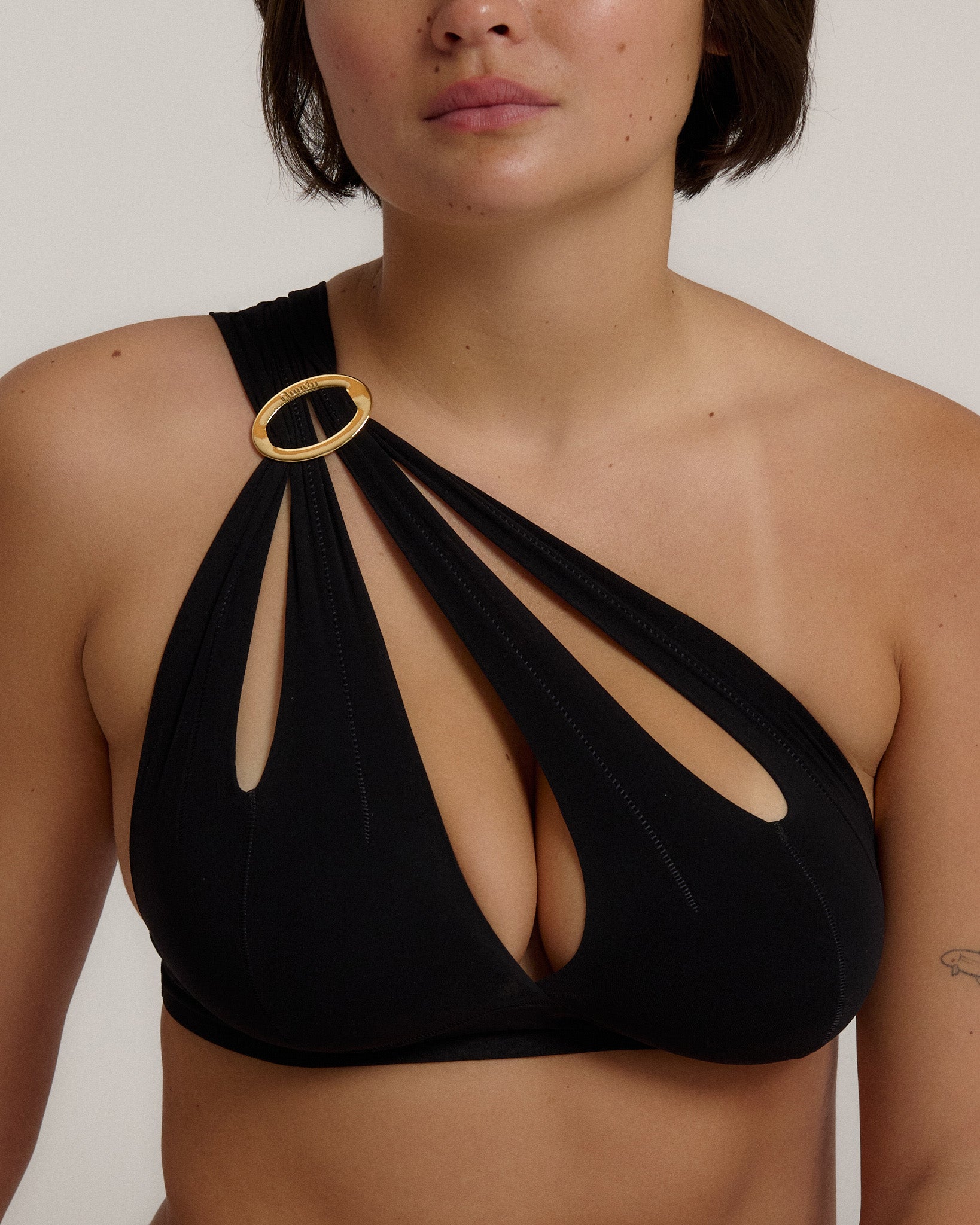 Woman wearing Nuudii Tee System with Gold Back Clip