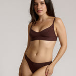 woman in mocha cami system on a plain background