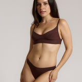 woman in mocha cami system on a plain background