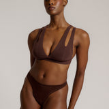 A mocha Tee System, designed with multiple strap options