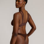 A mocha Tee System, designed with multiple strap options