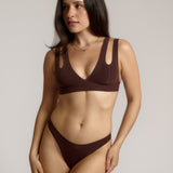 A mocha Tee System, designed with multiple strap options