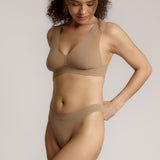 A person wearing a light vii system against a plain background