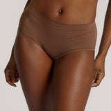 A mid-rise brown brief underwear with a seamless design, showing the waistband and part of the leg openings.