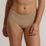 A pair of beige, mid-rise women's underwear.