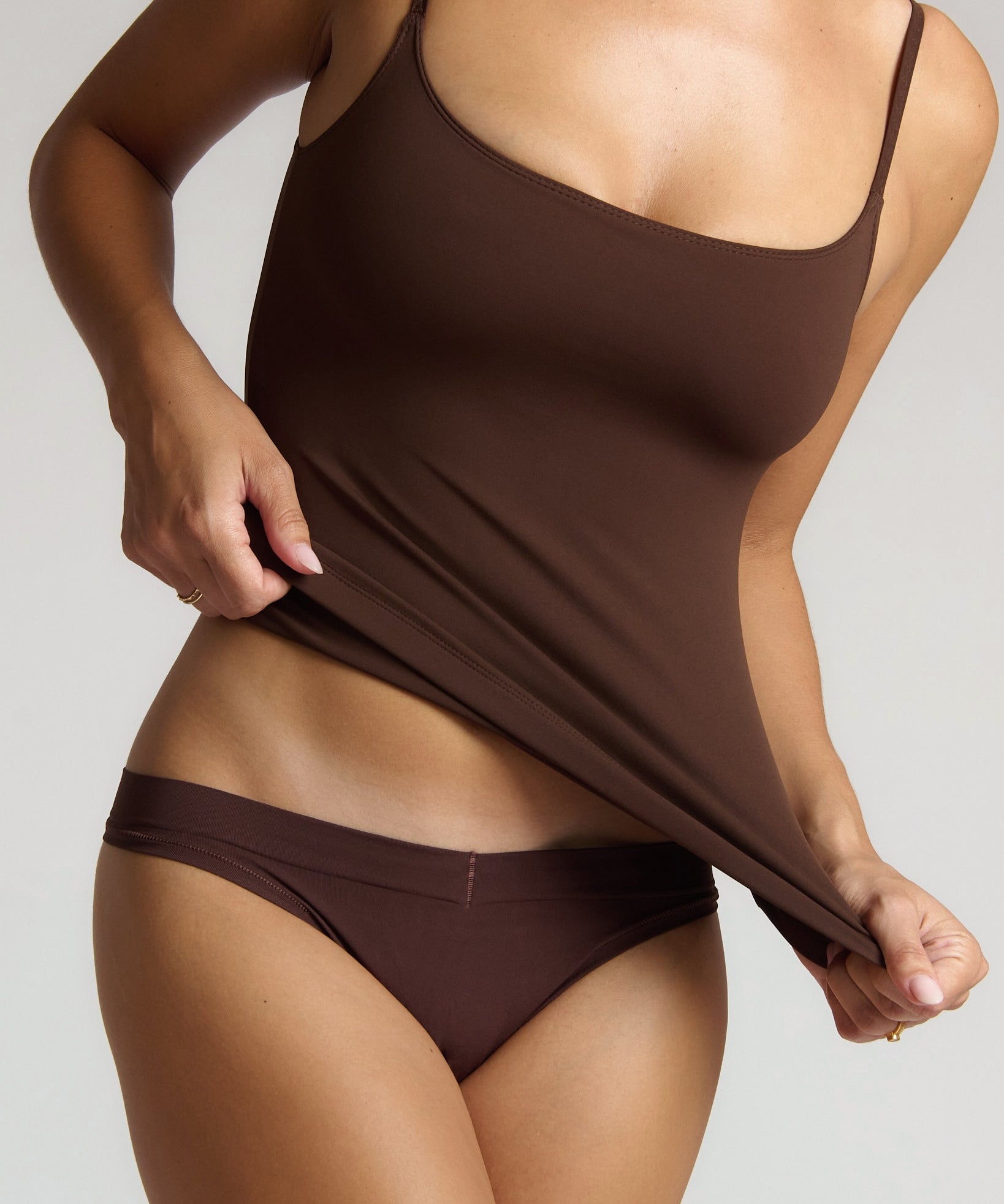 Brown cami top with plain background