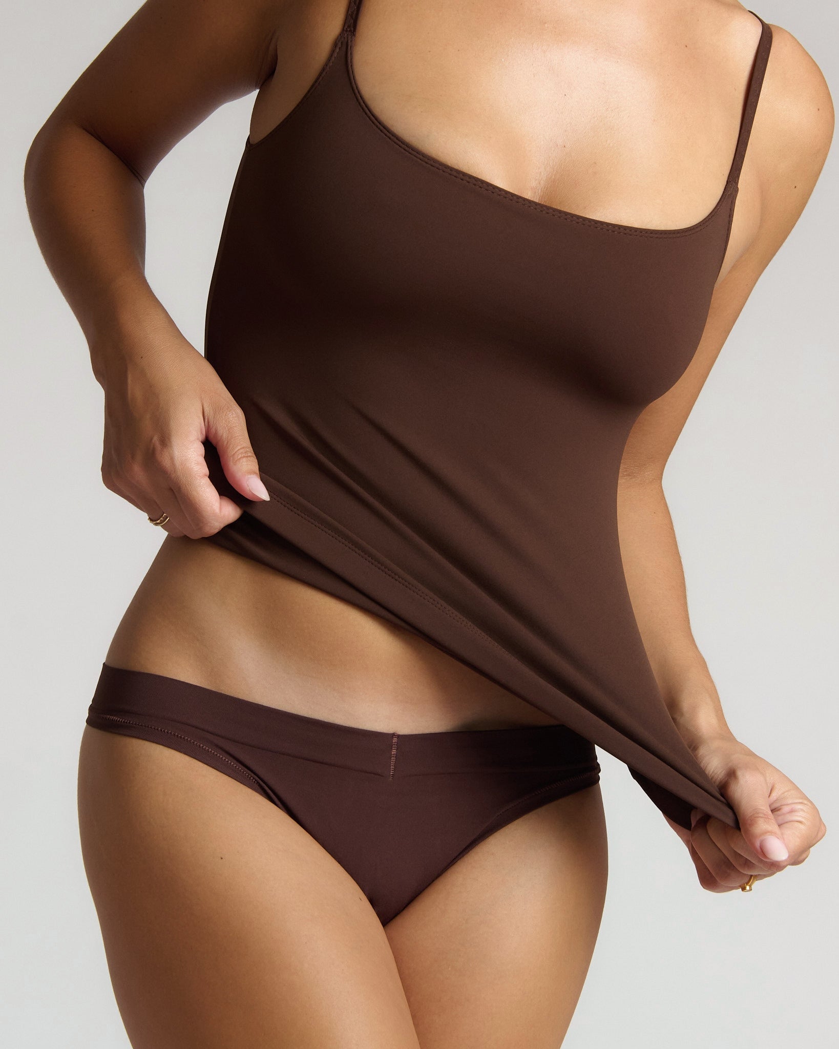 Brown cami top with plain background
