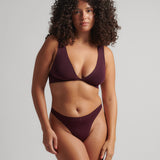 Woman wearing the Merlot Twist System