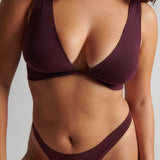 Woman wearing the Merlot Twist System