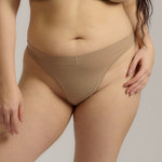 Woman standing wearing the Thong in light