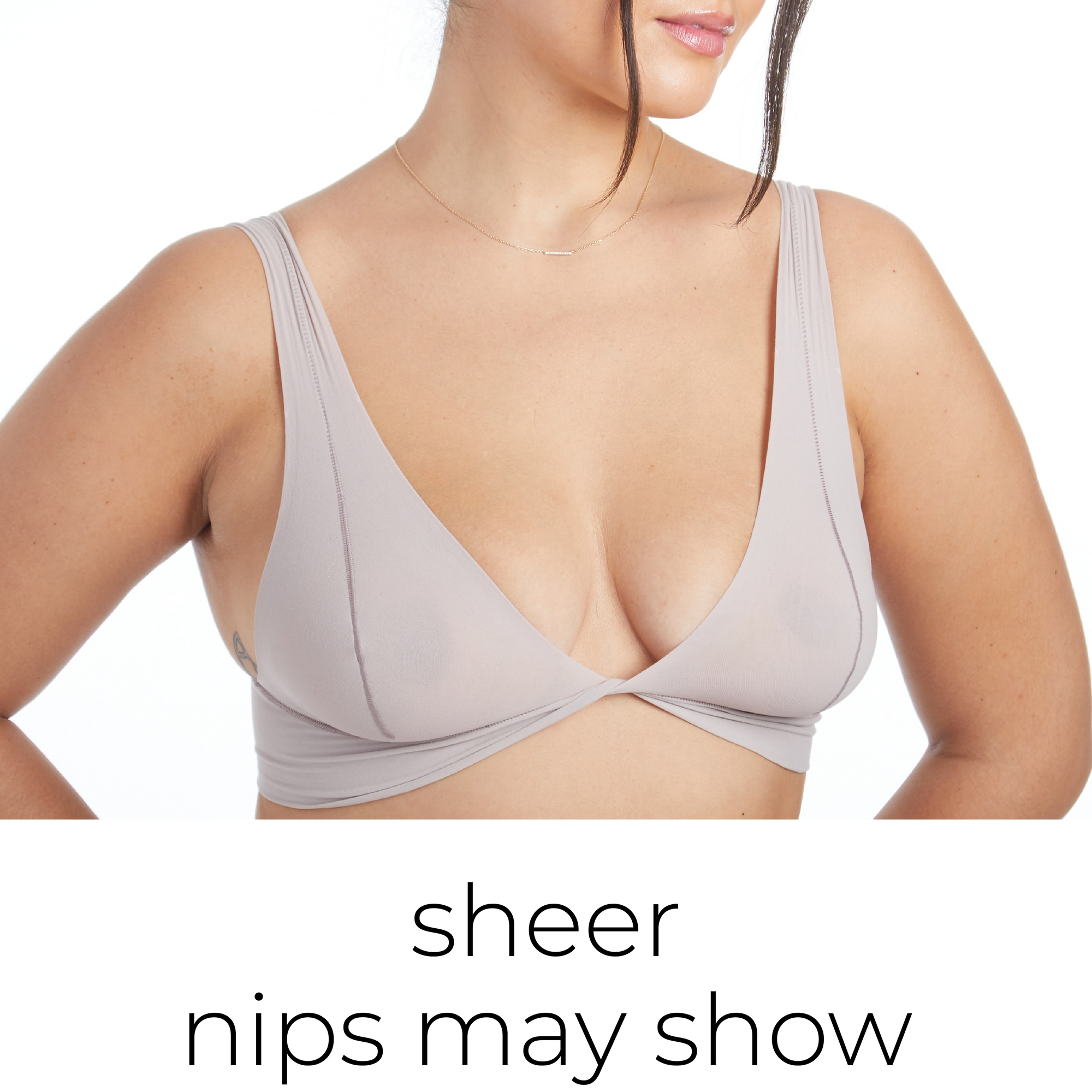 Front view of a woman wearing the Twist System in Dusk text: sheer nips may show