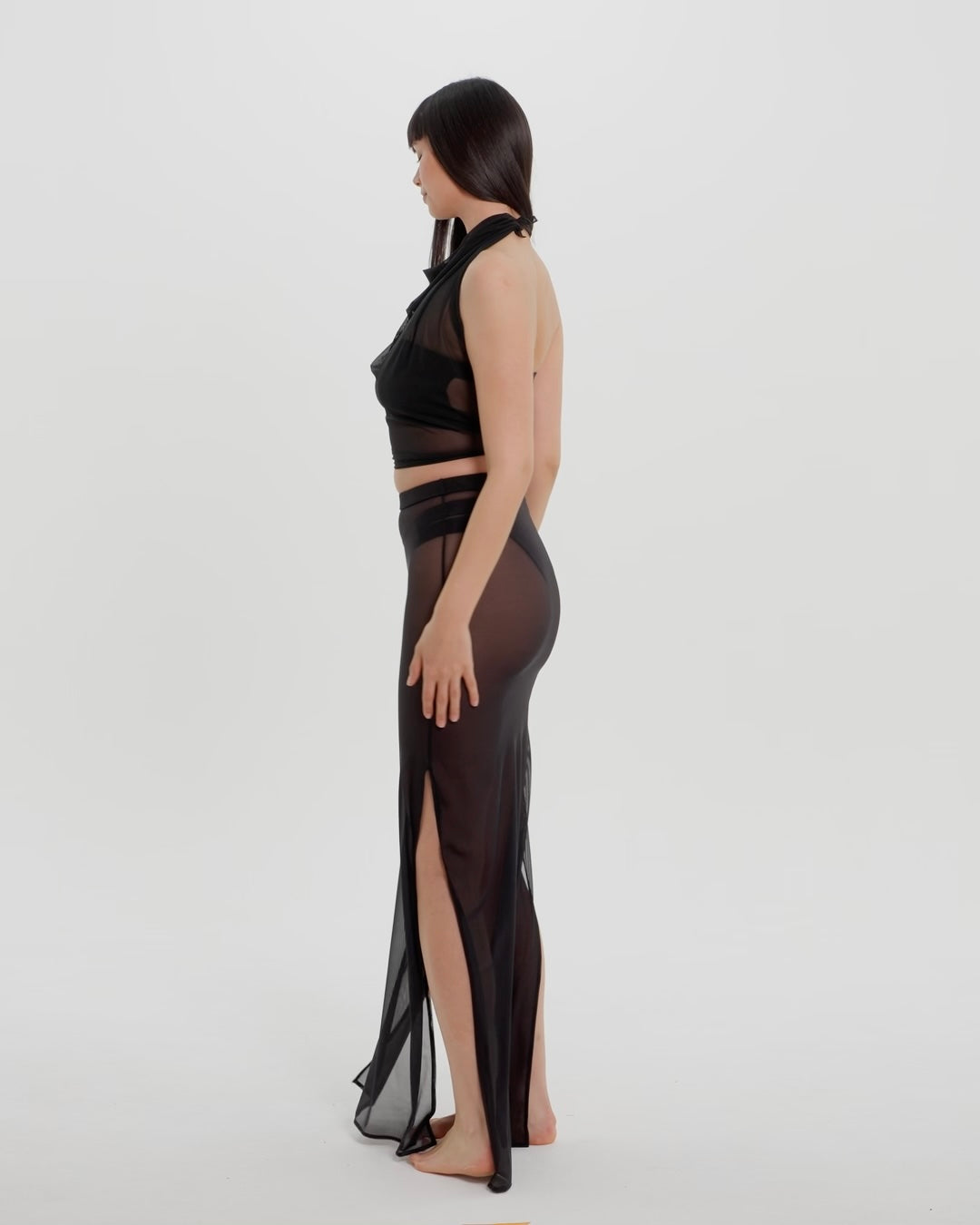 mesh scarf worn as a top